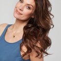 Woman with long brown wavy hair