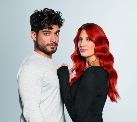 Red hair female model and male model
