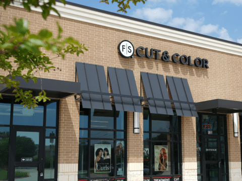 Salon storefront with new logo